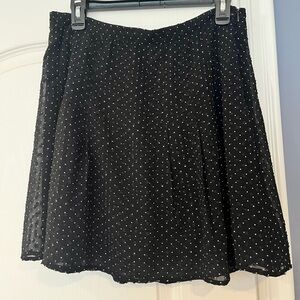 Pleated, sheer skirt with black lining, polka dot